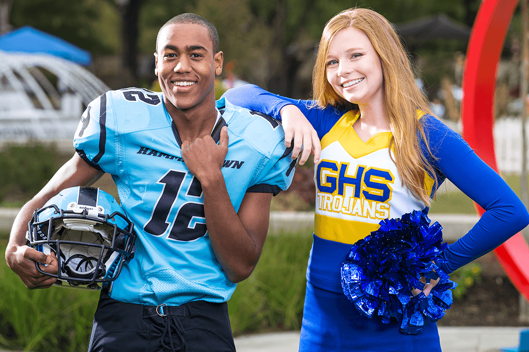 Football player and cheerleader